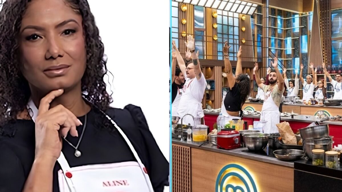 Aline, participante do MasterChef Brasil 2026, com o avental do programa, ao lado da cozinha do reality